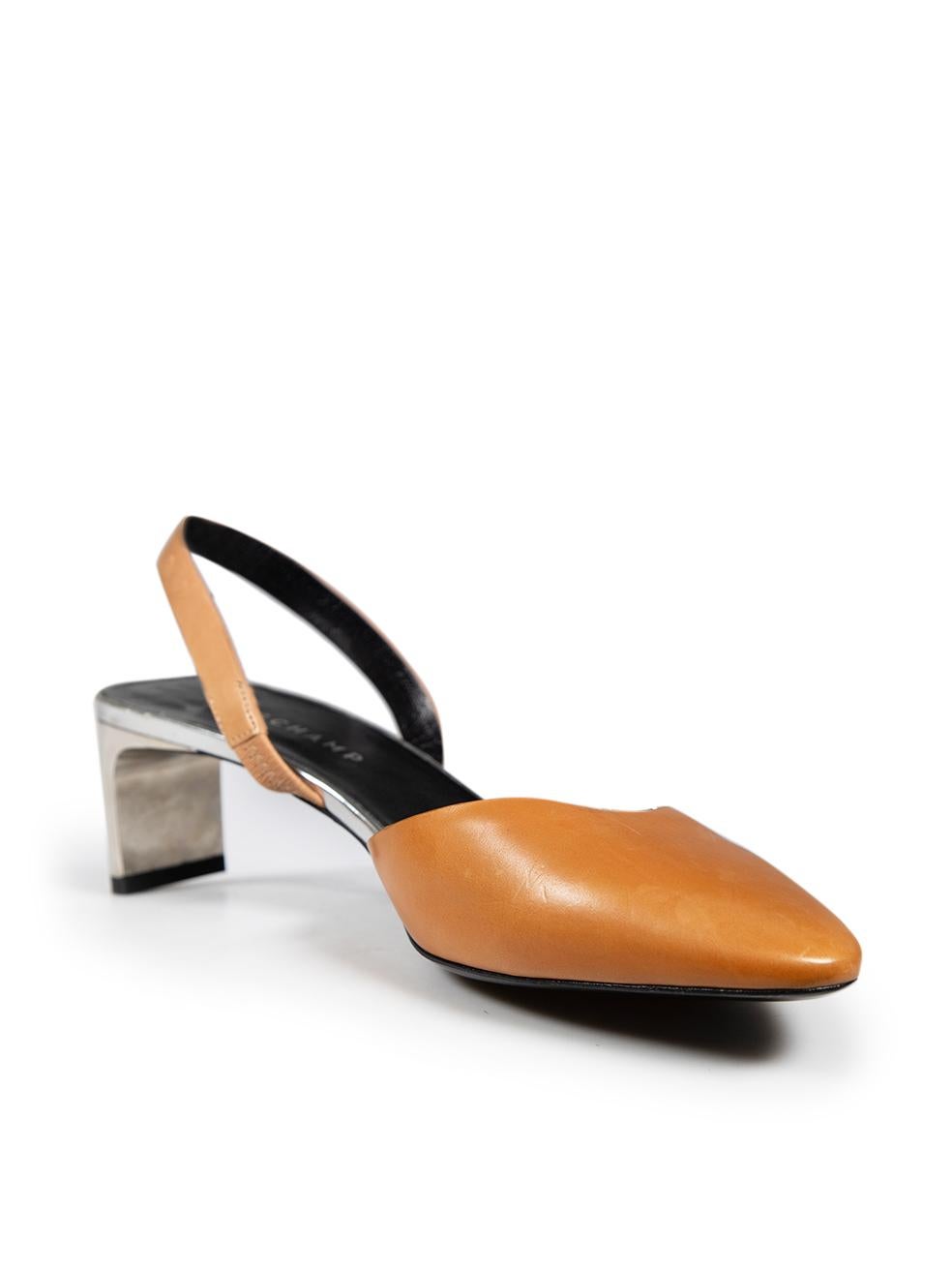CONDITION is Very good. Minimal wear to the pumps is evident. Abrasion across the front, heel strap, back of in sole and heel on both shoes on this used Longchamp designer resale item. This pair of shoes comes in the original dust bag. 
 
 
 
