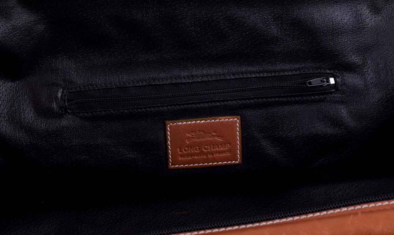 Longchamp, France. Travel bag in full-grain leather with a rose motif. For Sale 1