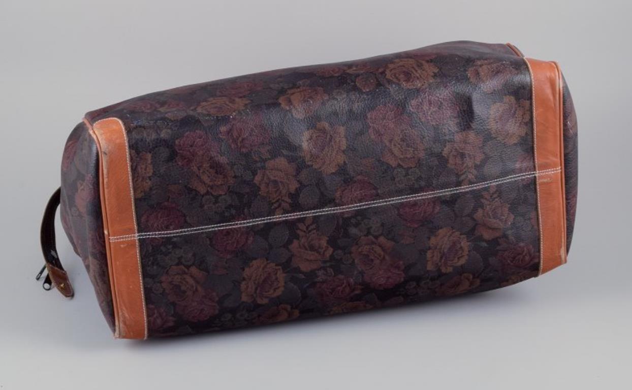 Longchamp, France. Travel bag in full-grain leather with a rose motif. For Sale 3