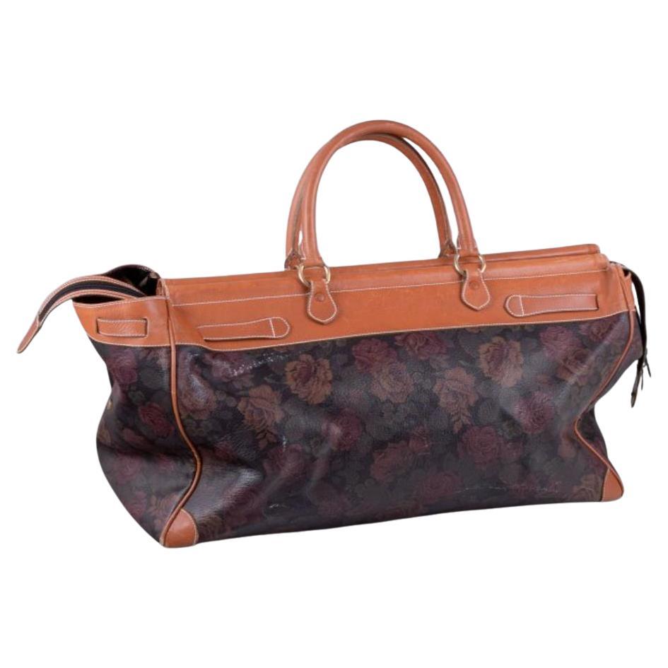 Longchamp, France. Travel bag in full-grain leather with a rose motif.