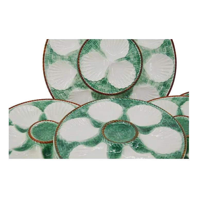 French art ceramic Majolica oyster set by Longchamp (Côte d'or), France, 1930s. Set composed of a platter and 12 plates in excellent condition. So this set is complete which makes it an exceptional whole. Measurements: Platter diameter 33cm/ 13
