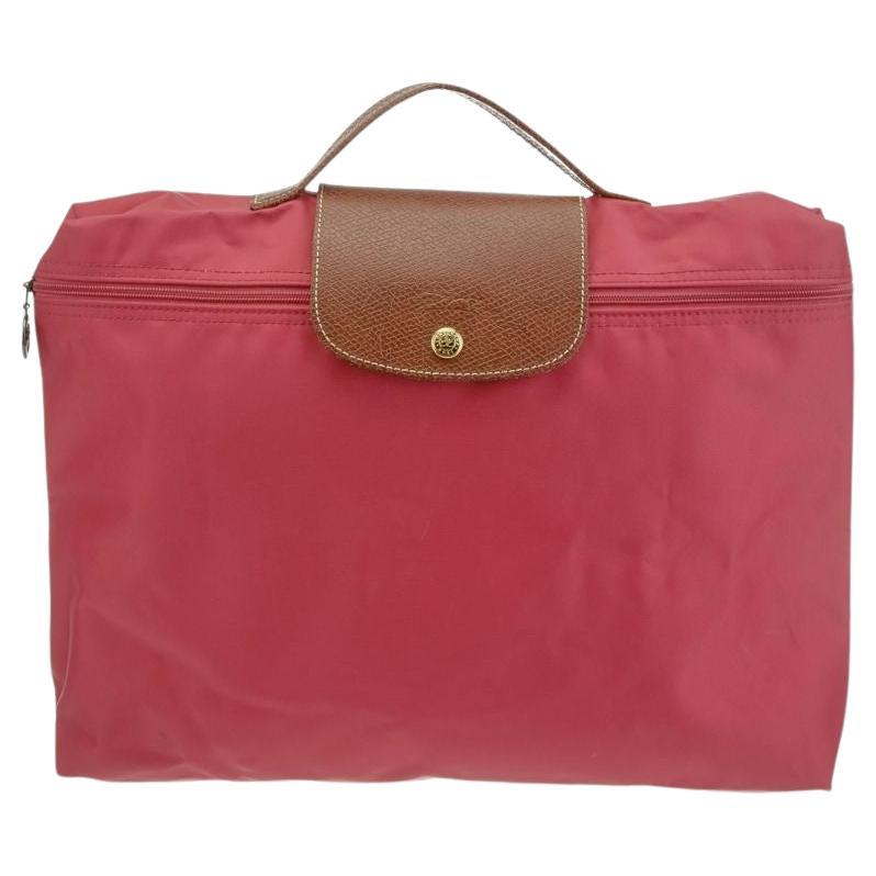 Longchamp Le Pliage Rote Nylon Aktentasche mit braunem Lederbesatz