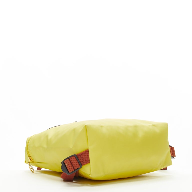 LONGCHAMP Le Pliage yellow nylon brown canvas trim foldaway backpack bag For Sale 1