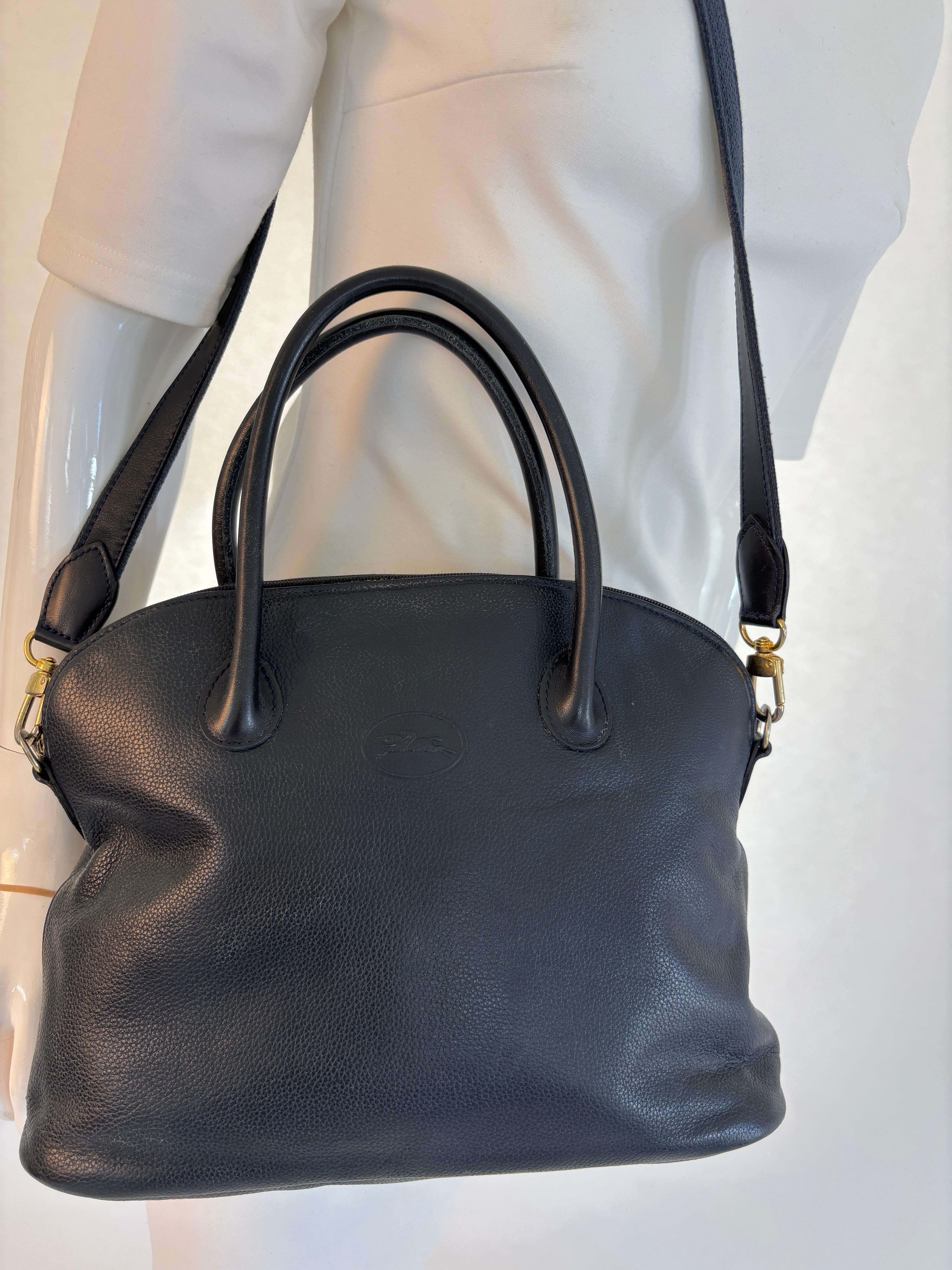 Longchamp Leather Handbag Made in France.
Longchamp vintage bowling bag with pebbled leather in black color. 
Vintage hard-to-find 1980s Longchamp medium crossbody handbag in top grain pebble leather with brass hardware.
Authentic Longchamp black