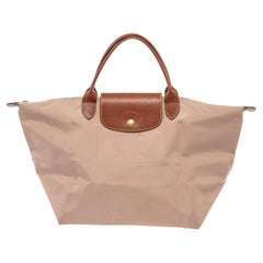 Longchamps Borsa Le Pliage Medium in nylon rosa chiaro con finiture dorate