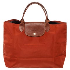 Longchamp Red Nylon Le Pliage Medium no zipper tote bag with gold-tone hardware