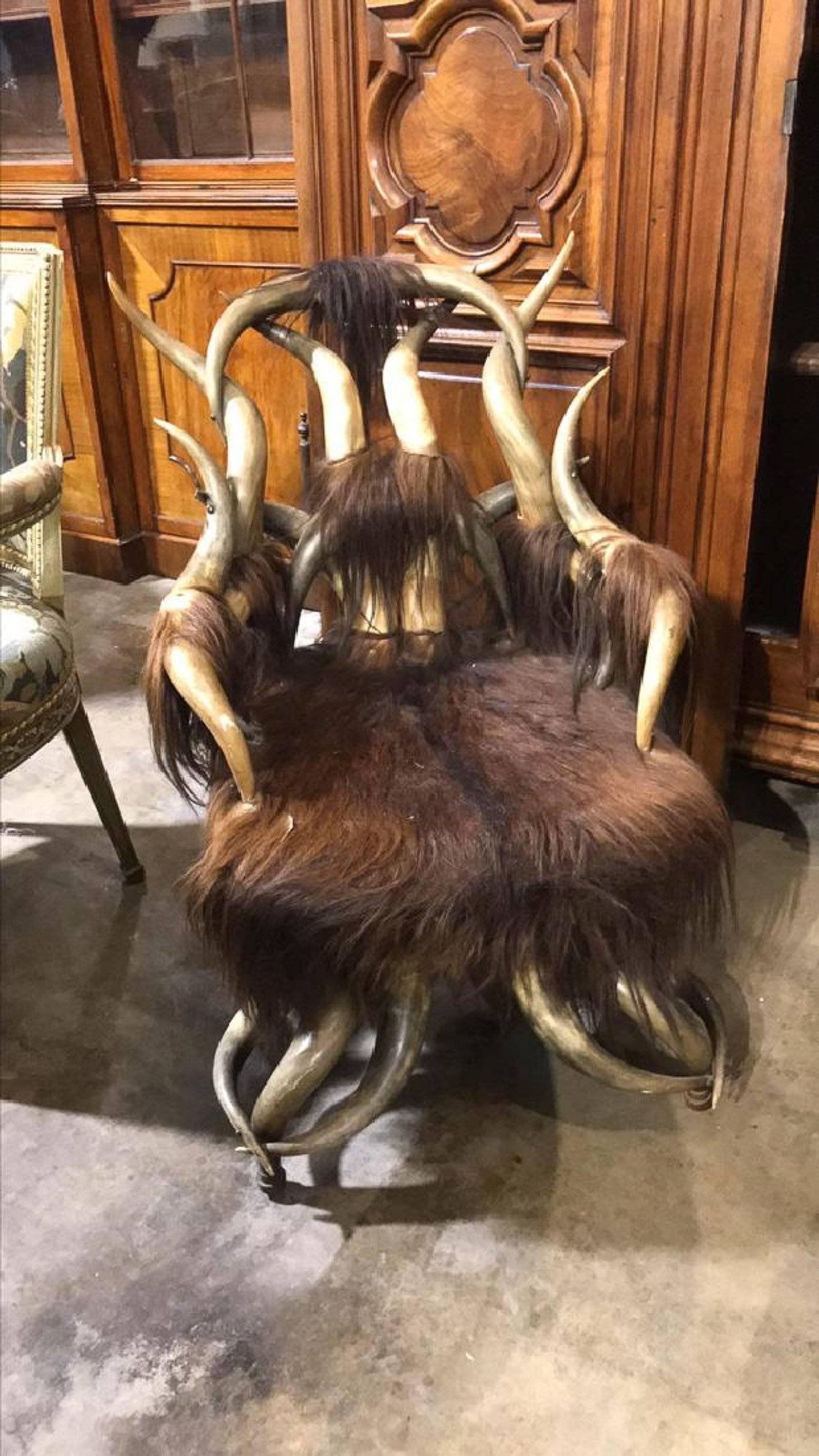 Highly decorative and unique Longhorn and Horsehair upholstered armchair. Hard to find piece. Great lodge or ranch house chair!