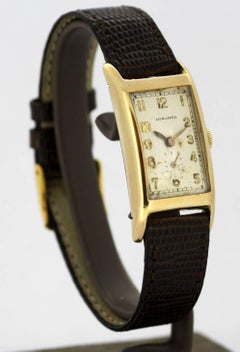 Longines:: montre-bracelet vintage en or jaune 14 carats à remontage manuel:: 1937