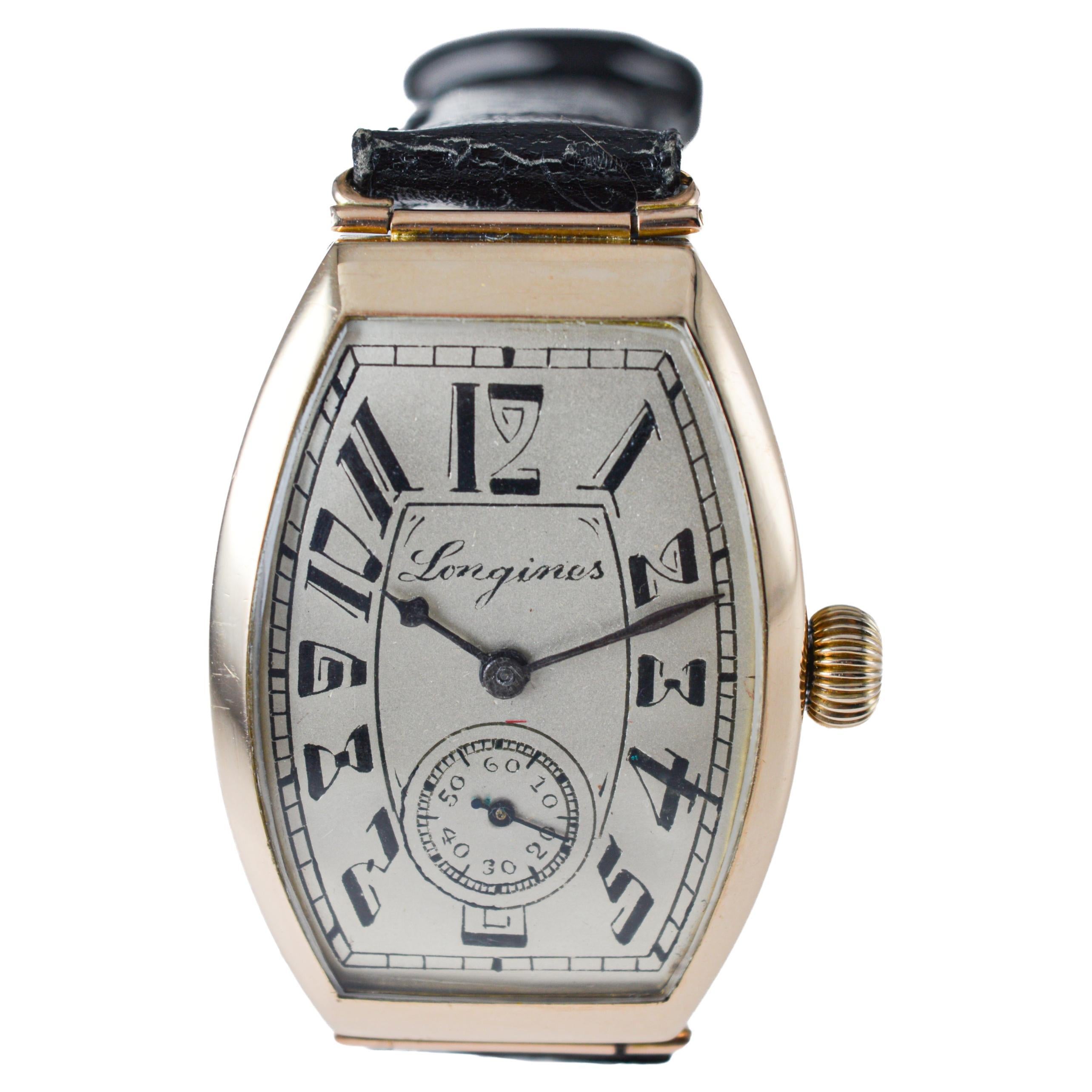 Women's or Men's Longines 14 Karat Gold Art Deco Tonneau Shaped Manual Watch, circa 1920s
