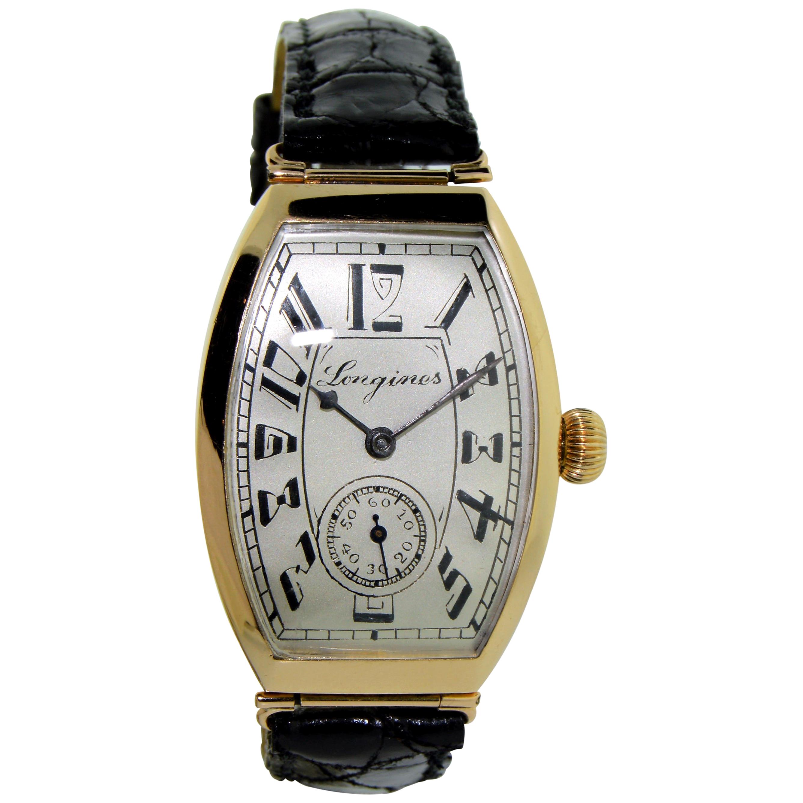 Longines 14 Karat Gold Art Deco Tonneau Shaped Manual Watch, circa 1920s