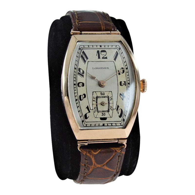 FACTORY / HOUSE: Longines Watch Company
STYLE / REFERENCE: Art Deco / Tonneau
METAL / MATERIAL: 14Kt. Solid Gold 
CIRCA / YEAR: Mid Teens
DIMENSIONS / SIZE: Length 51mm X Width 31mm
MOVEMENT / CALIBER: Manual Winding / 15 Jewels 
DIAL / HANDS: