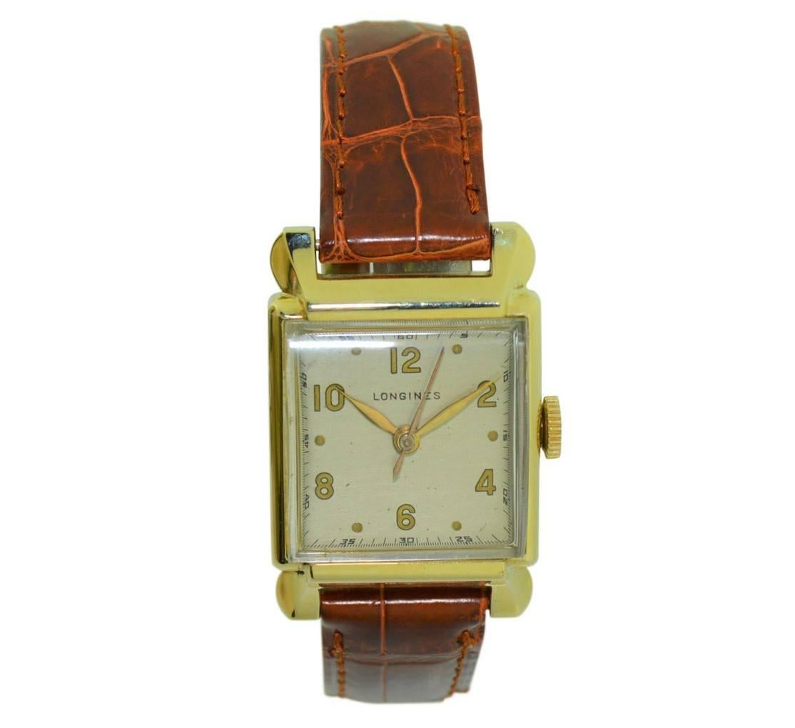 FACTORY / HOUSE: Longines Watch Company
STYLE / REFERENCE: Art Deco
METAL / MATERIAL: 14Kt. Yellow Gold
CIRCA: 1940's
DIMENSIONS: 38mm X 25mm
MOVEMENT / CALIBER: Manual Winding / 17 Jewels 9L
DIAL / HANDS: Silvered with Gilt Arabic