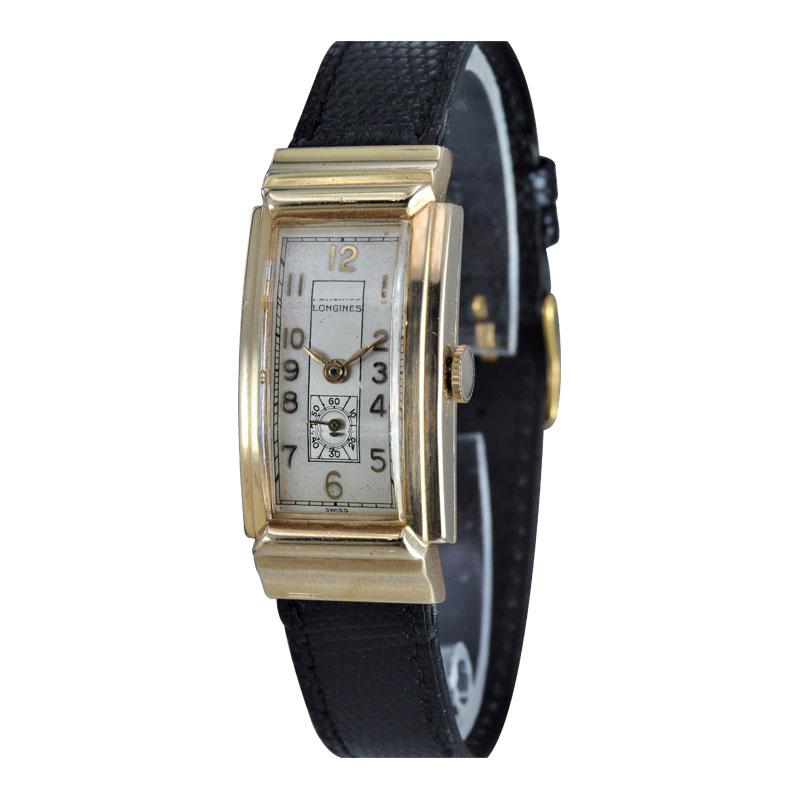 FACTORY / HOUSE: Longines Watch Company
STYLE / REFERENCE: Art Deco / Tank
METAL / MATERIAL: 14kt Solid Gold
CIRCA: 1940's
DIMENSIONS: 42mm x 20mm
MOVEMENT / CALIBER: Manual Winding / 17 Jewels / Cal. 9L
DIAL / HANDS: Original Two Tone Silvered with