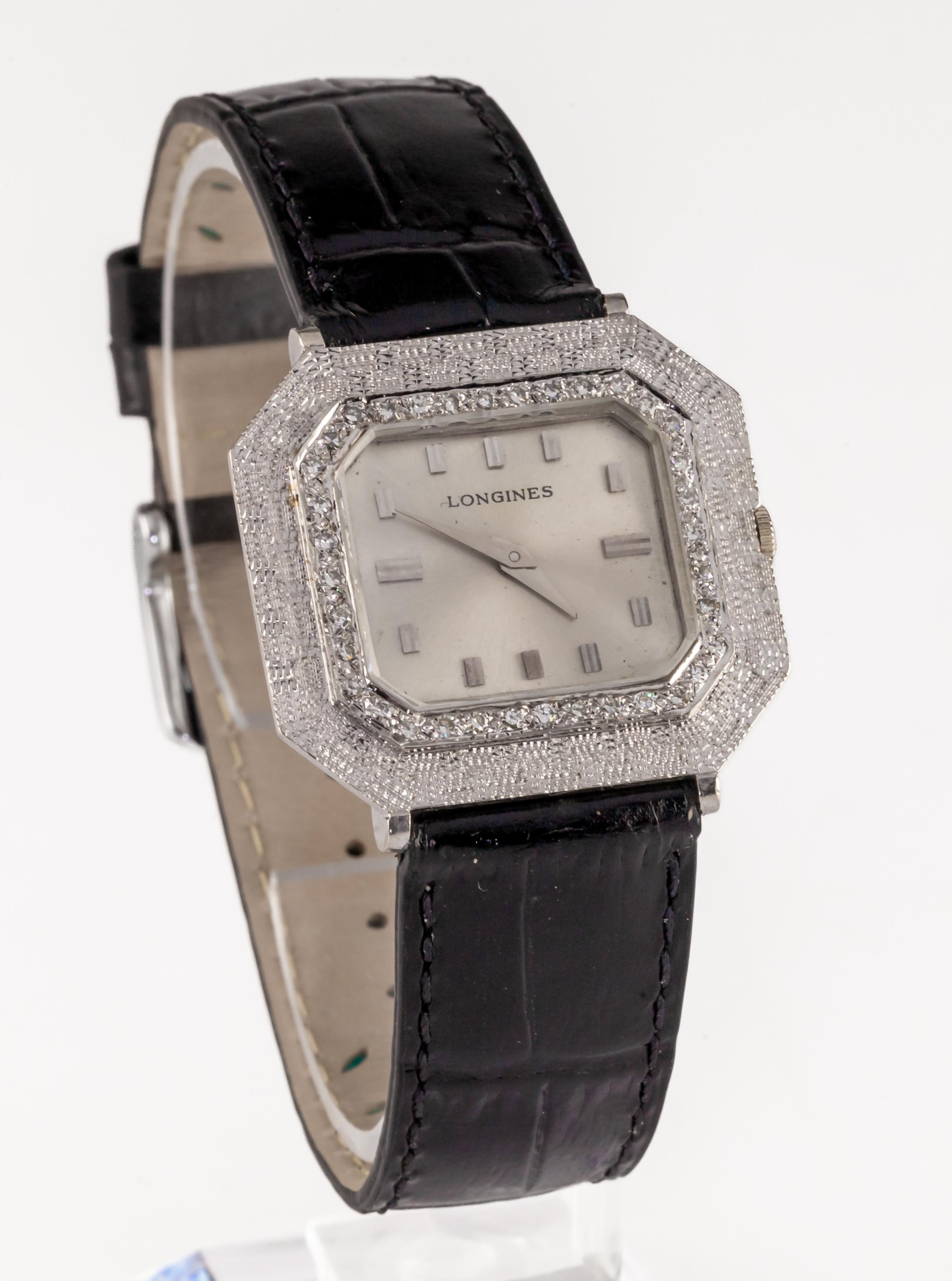 Longines 14k White Gold Square Men's Dress Watch w/ Diamond Bezel 428
Movement #428
Movement Serial #14661856
Case #865350-216

14k White Gold Case w/ Textured Bezel and Diamond Inner Bezel
31 mm Wide (32 mm w/ Crown)
29 mm Long
Lug-to-Lug Distance