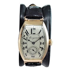 Longines 14 Karat Gold Art Deco Tonneau Shaped Manual Watch, circa 1920s