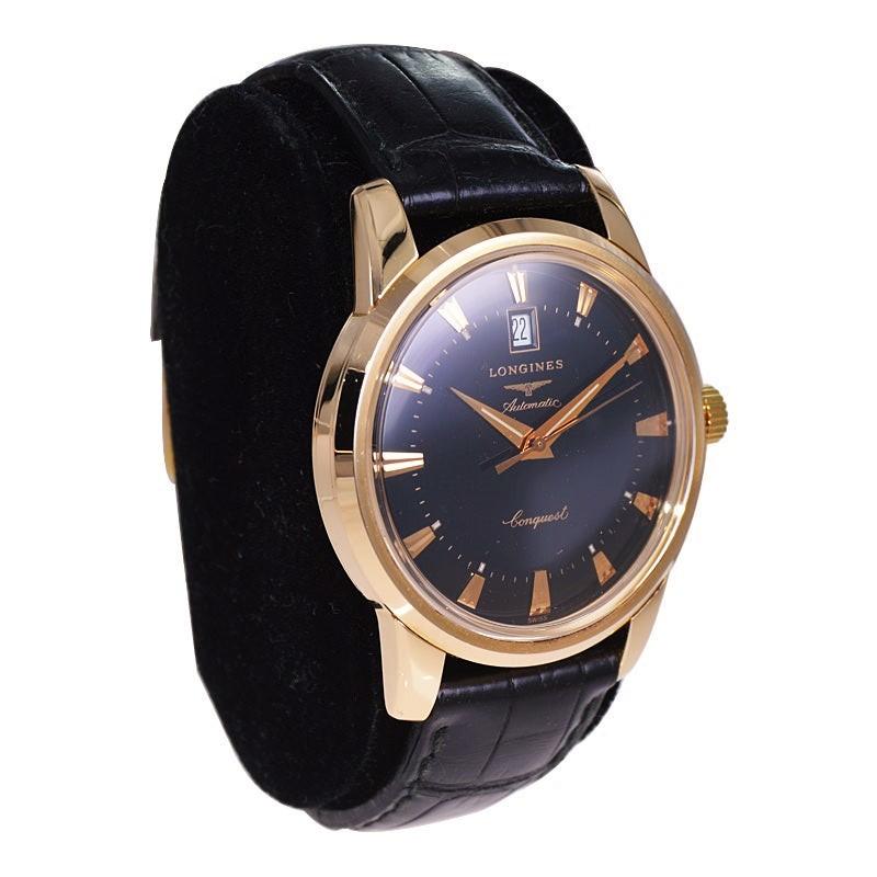 FACTORY / HOUSE: Longines Watch Co.
STYLE / REFERENCE: Conquest
METAL / MATERIAL: 18kt Rose Gold
CIRCA / YEAR: 2000
DIMENSIONS / SIZE: Length 49mm x Diameter 40mm
MOVEMENT / CALIBER: Automatic Winding / Jewels 
DIAL / HANDS: Black Dial / Rose Gold