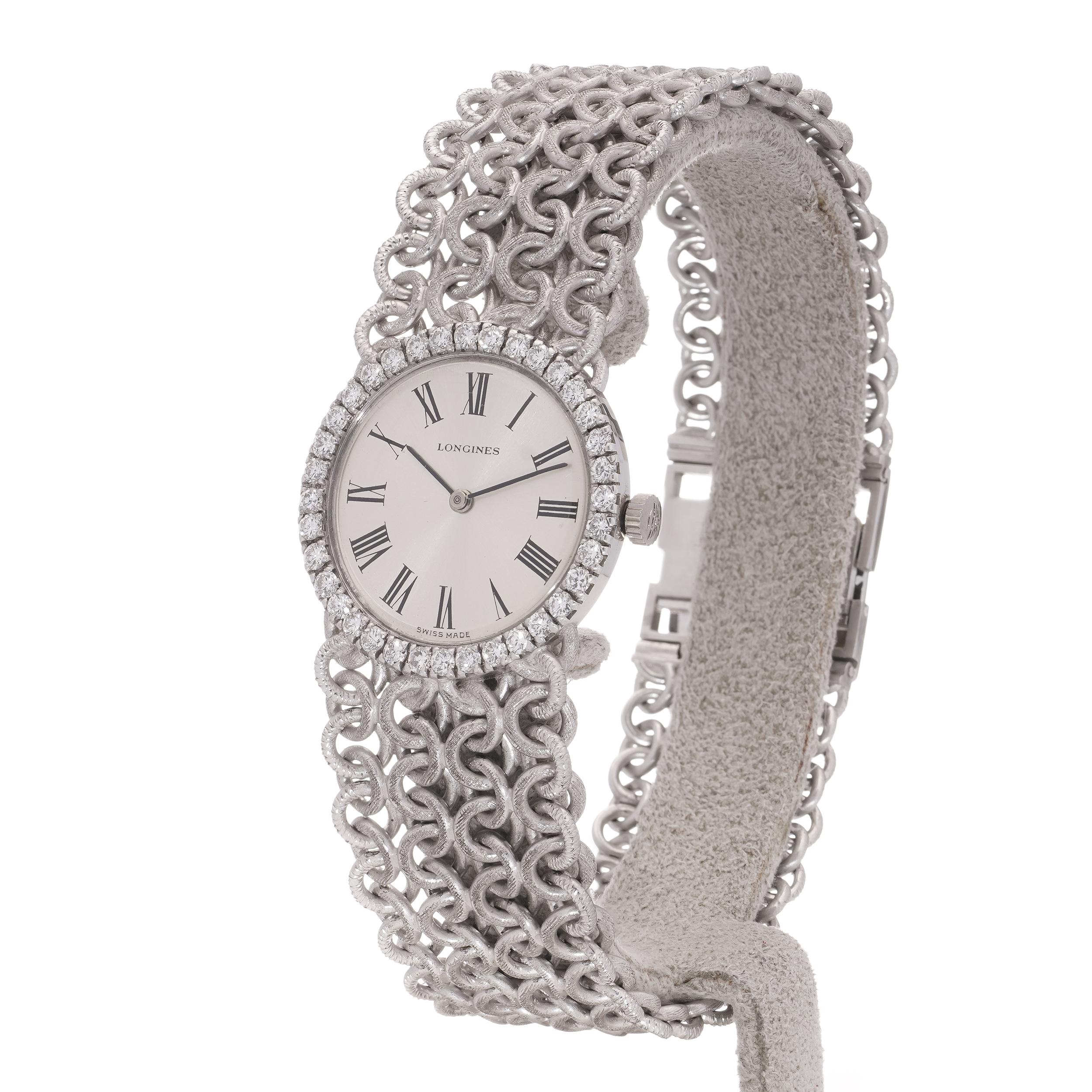 Taille brillant Longines Montre-bracelet pour femme en or blanc 18 carats avec lunette sertie de diamants en vente
