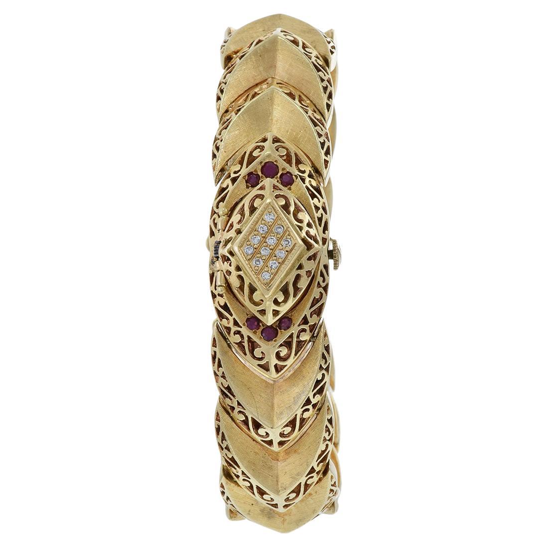 Longines Montre pour femmes des années 1960, en or jaune 14 carats, diamants et rubis