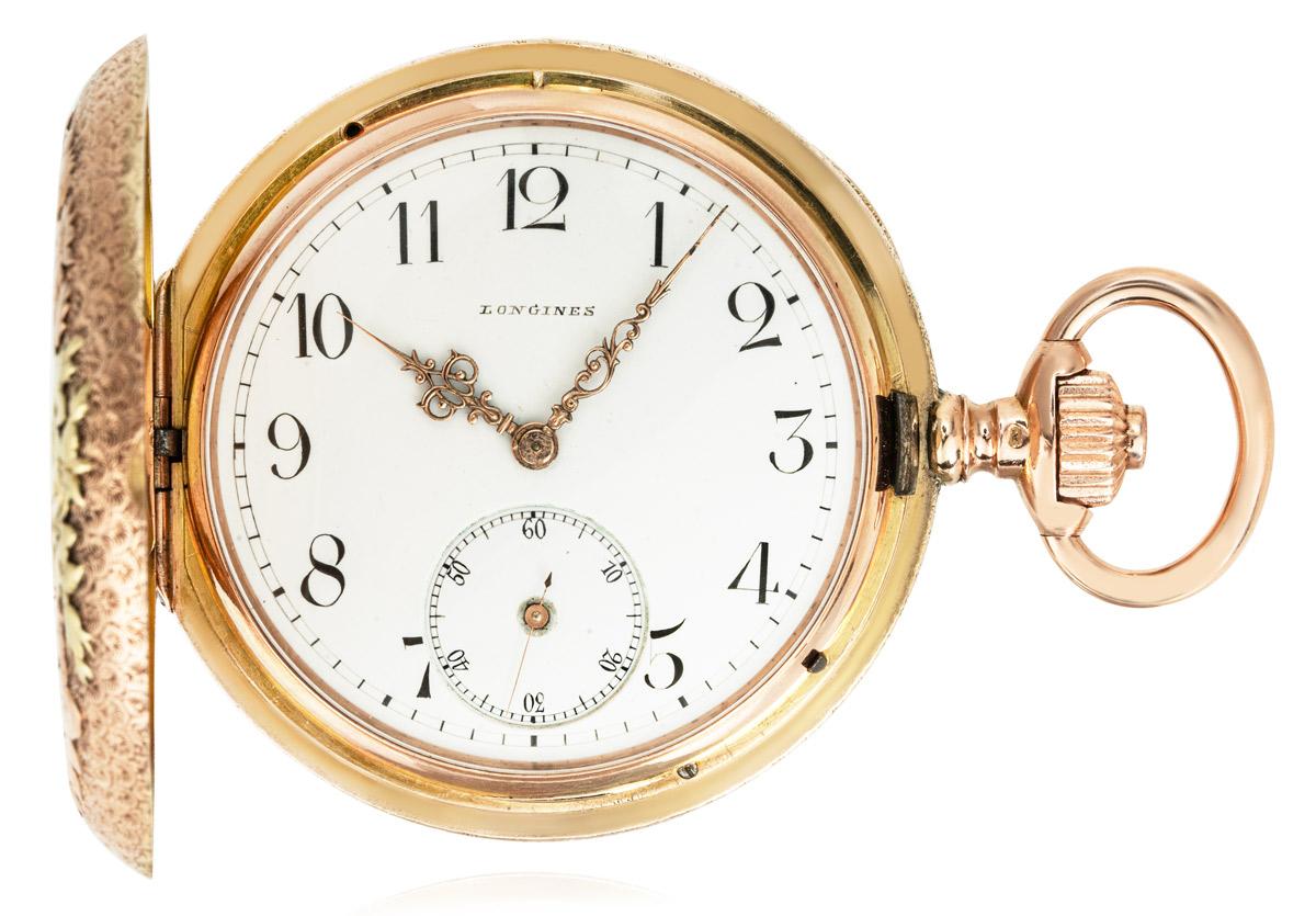 Longines. A Rare Hunting Festival Rose & Green Gold Keyless Lever Full Hunter Pocket Watch C!900.

Dial: The white enamel dial signed Longines, with Arabic numerals, outer minute track and subsidiary seconds dial at six o'clock The original Louis