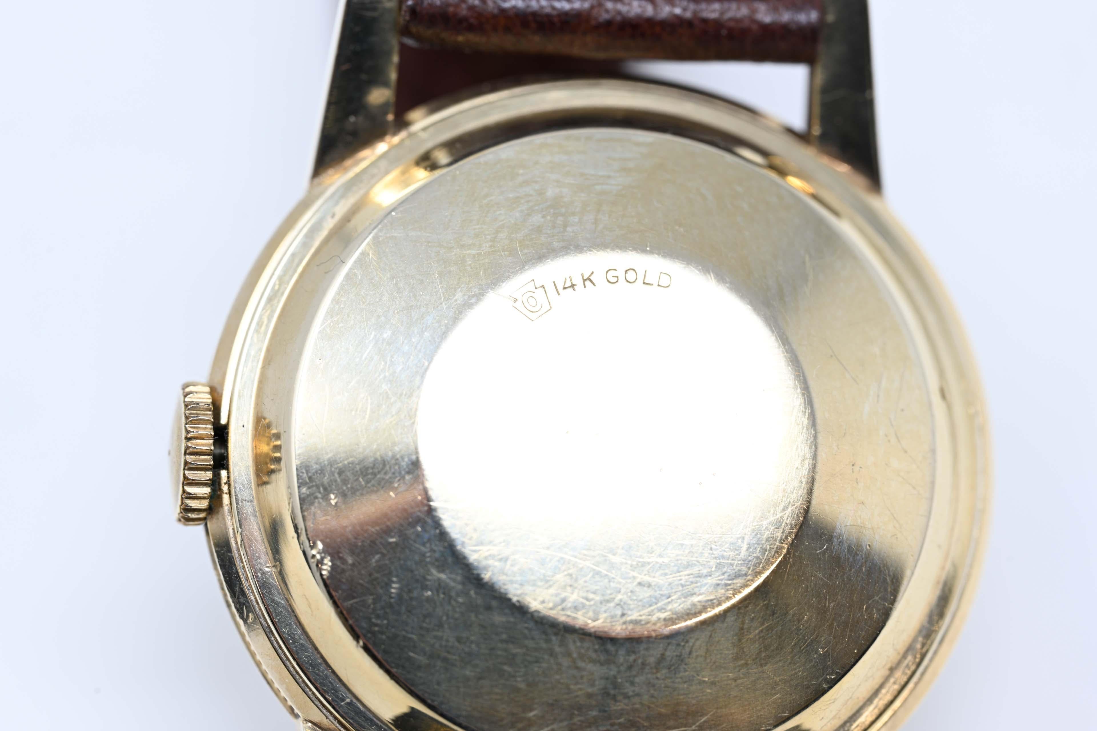 longines automatic gold watch