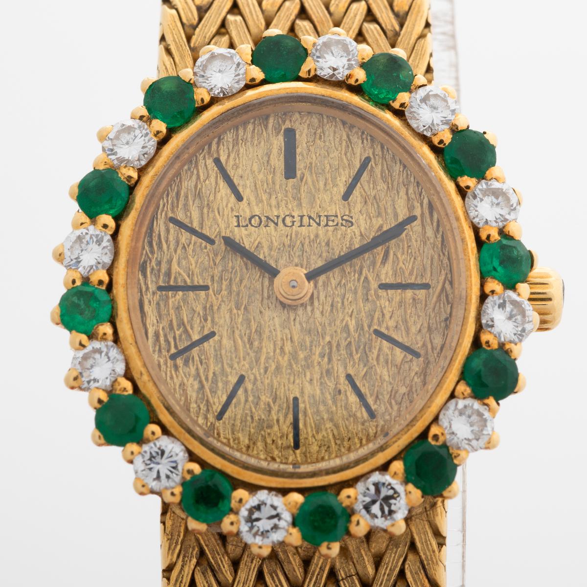 Women's Longines Cocktail Watch, 18K Yellow Gold, 12 x Emeralds / Diamonds. Circa 1964. For Sale