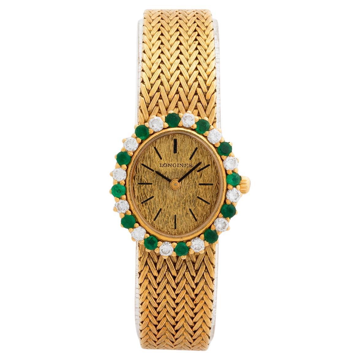 Longines Cocktail Watch, 18K Yellow Gold, 12 x Emeralds / Diamonds. Circa 1964. For Sale