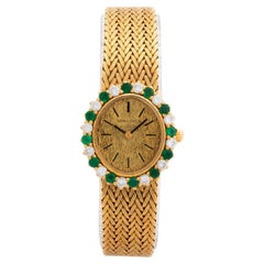 Antique Longines Cocktail Watch, 18K Yellow Gold, 12 x Emeralds / Diamonds. Circa 1964.
