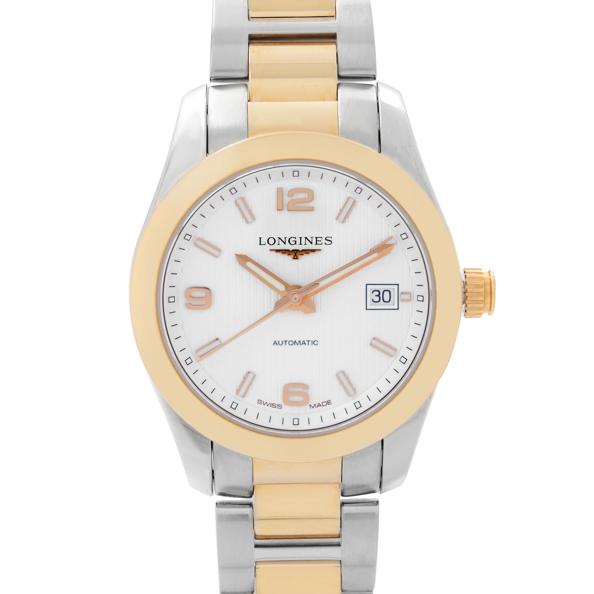 Display Model Longines Conquest Classic Steel Silver Dial Automatic Ladies Watch L2.285.5.76.7. This Beautiful Timepiece is Powered by Mechanical (Automatic) Movement and Features: Stainless Steel Case with a Stainless Steel & 18k Yellow Gold (cap