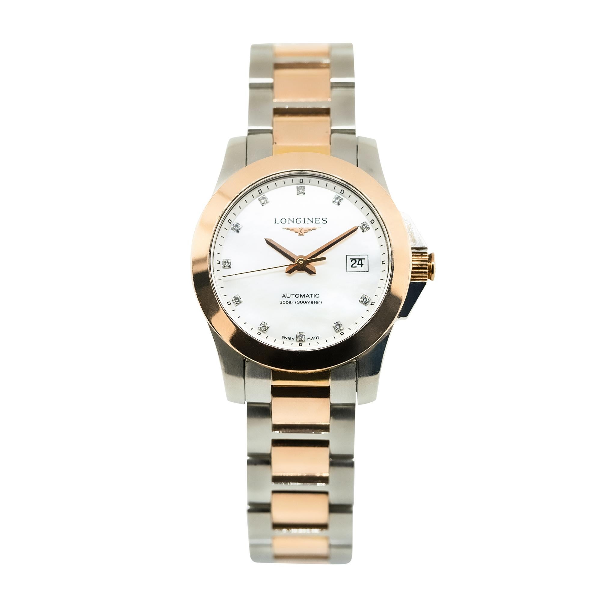 Brand: Longines
Reference: L3.276.5
Case Material: 18k Rose Gold and Stainless Steel Case
Case Diameter: 29.5 mm
Dial: Mother of Pearl with Diamond Accent Dial. Date can be found at 3 o'clock.
Bezel: 18k Rose Gold Bezel
Bracelet: 18k Rose Gold and