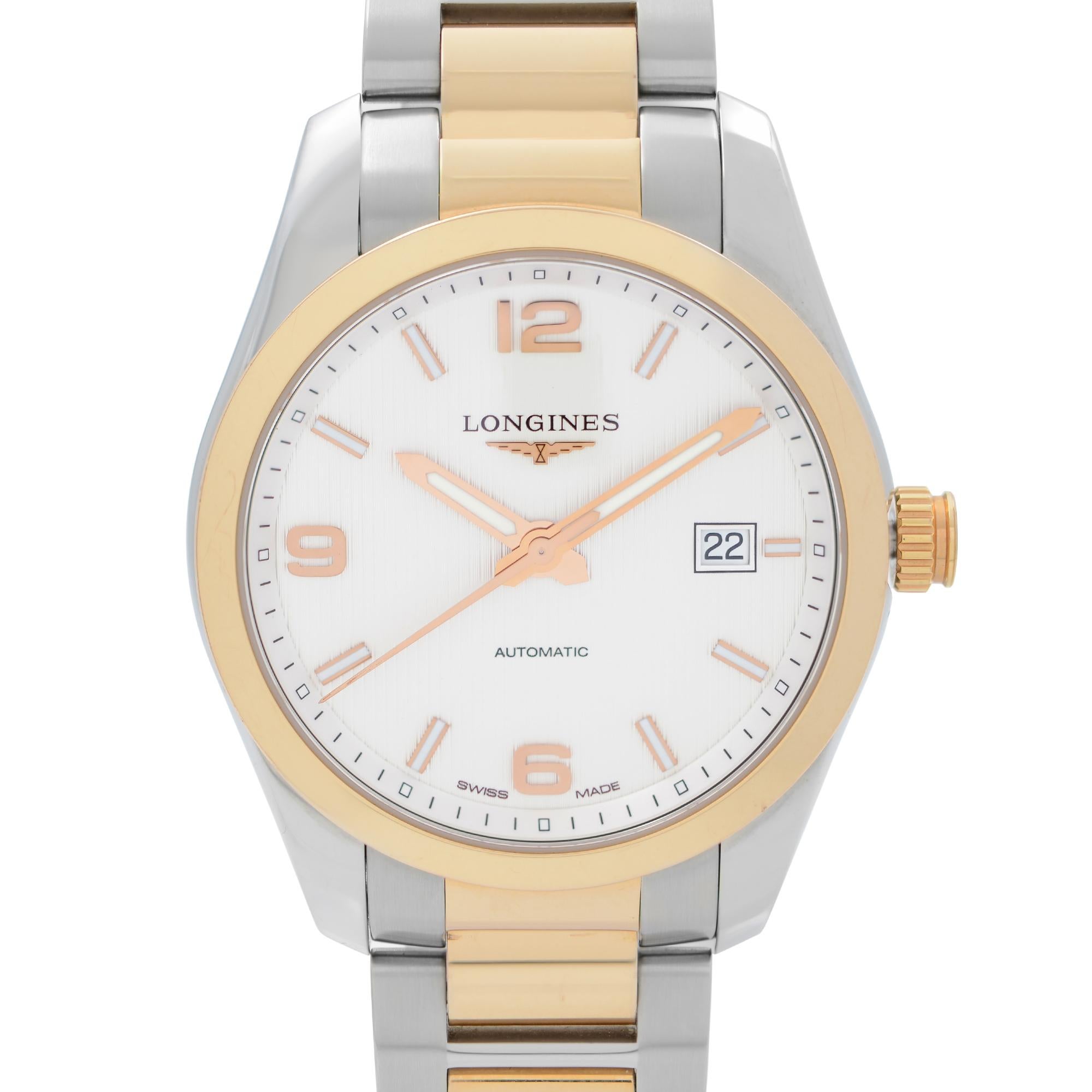 Store Display Model can have minor blemishes on the bezel and gold-tone parts. . Longines Conquest Two-Tone Steel White Dial Automatic Men's Watch L2.785.5.76.7 This Beautiful Timepiece is Powered by Mechanical (Automatic) and Features: Stainless