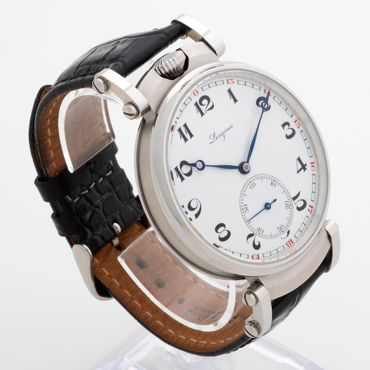 ur Longines has been professionally converted from a pocket watch to a wristwatch, retaining its prominent size 45mm x 56mm, reminiscent of an inter war pilots watch. The white dial has arabic numerals in the Breguet style and a minutes in red.