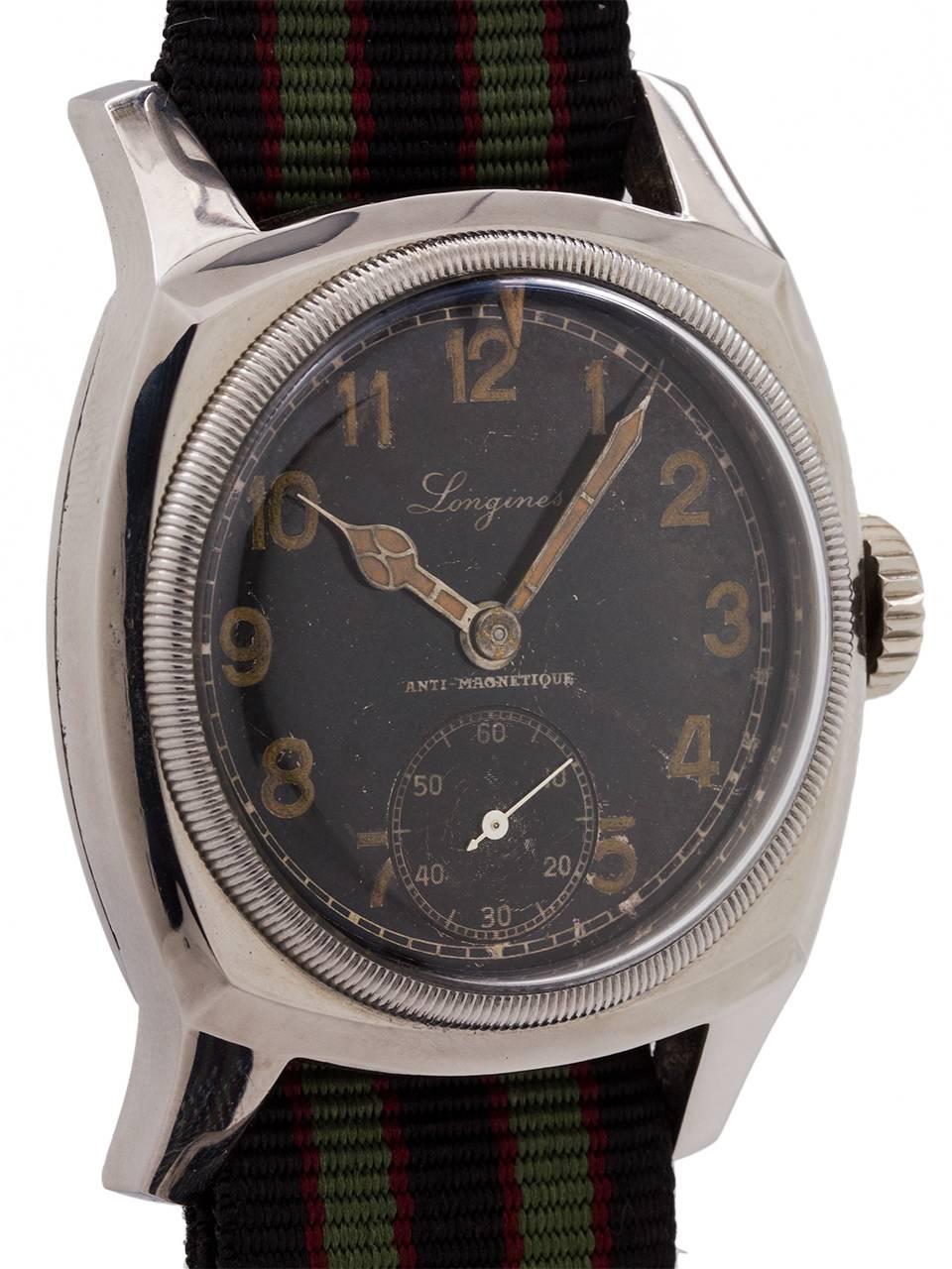 
Longines Stainless Steel Czech Military circa 1940’s. Massive over sized cushion shaped 40 X 52mm case, with milled bezel and elapsed time arrow indicator. Pleasing original gilt silvered dial with patina’d luminous indexes and matching spider web