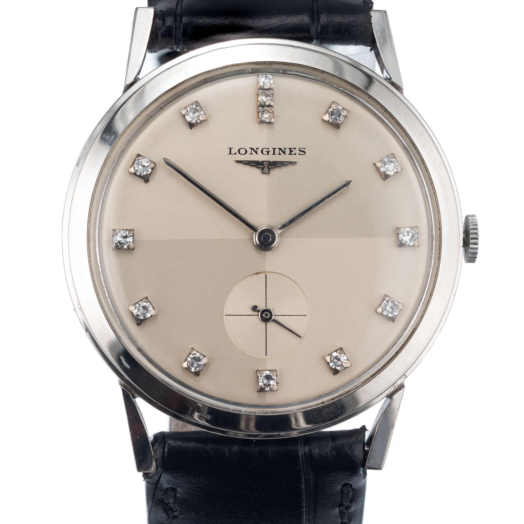 Longines Vintage 1960's round wristwatch in a solid white gold case with factory diamond dial. Manual wind

Length: 37.72mm
Width: 32mm
Band width at case: 18mm
Case thickness: 8.06mm
Band: black genuine leather
Crystal: Acrylic
Dial: cream/ diamond