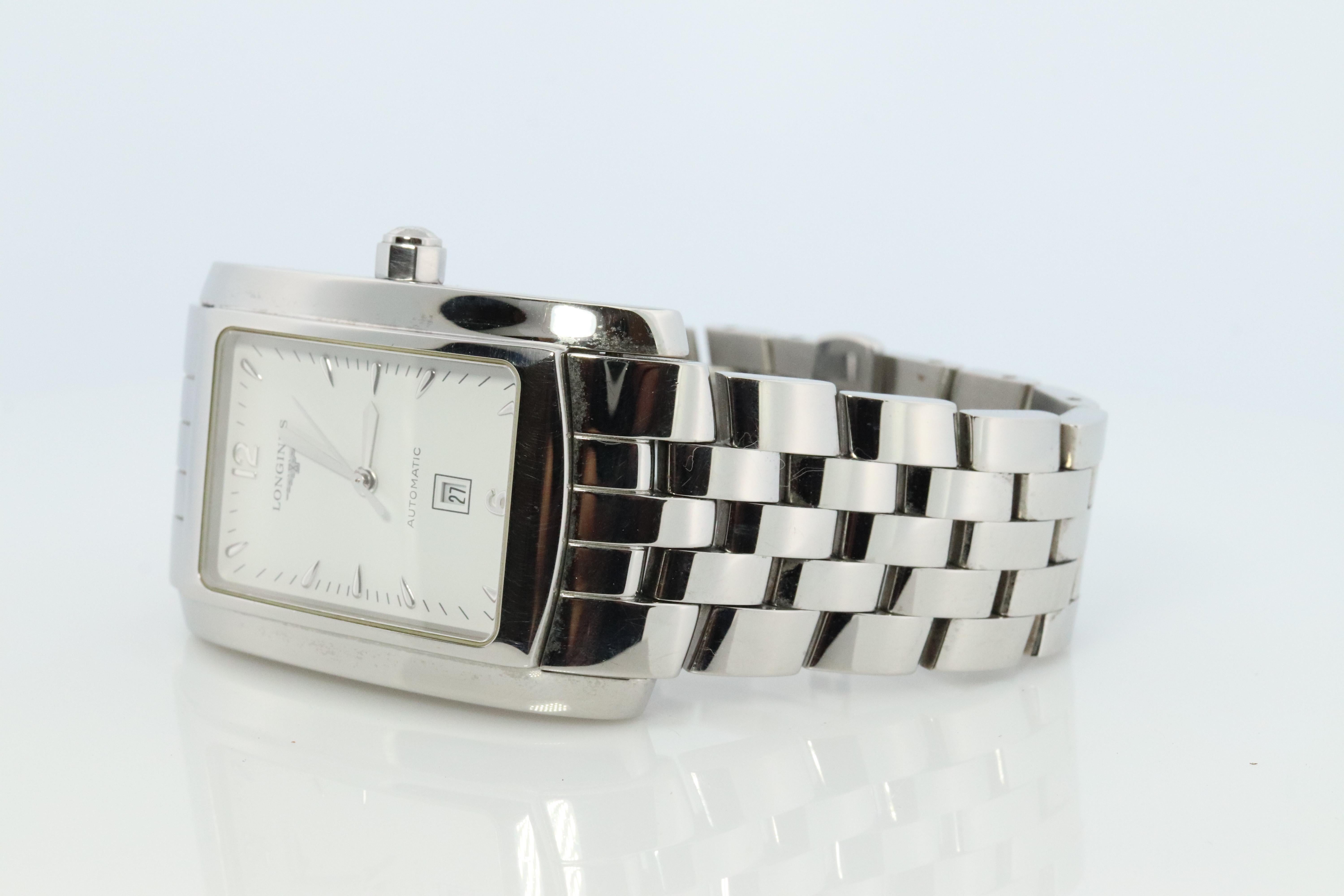 Raro LONGINES Doce Vita Tanque Automático 

Reloj de pulsera para caballero con pulsera de acero inoxidable.

Movimiento totalmente automático.

Caja rectangular de 30 mm por 47 mm.
Pulsera de 22 mm de ancho
Muñeca de 7,5 pulgadas actualmente

Gran