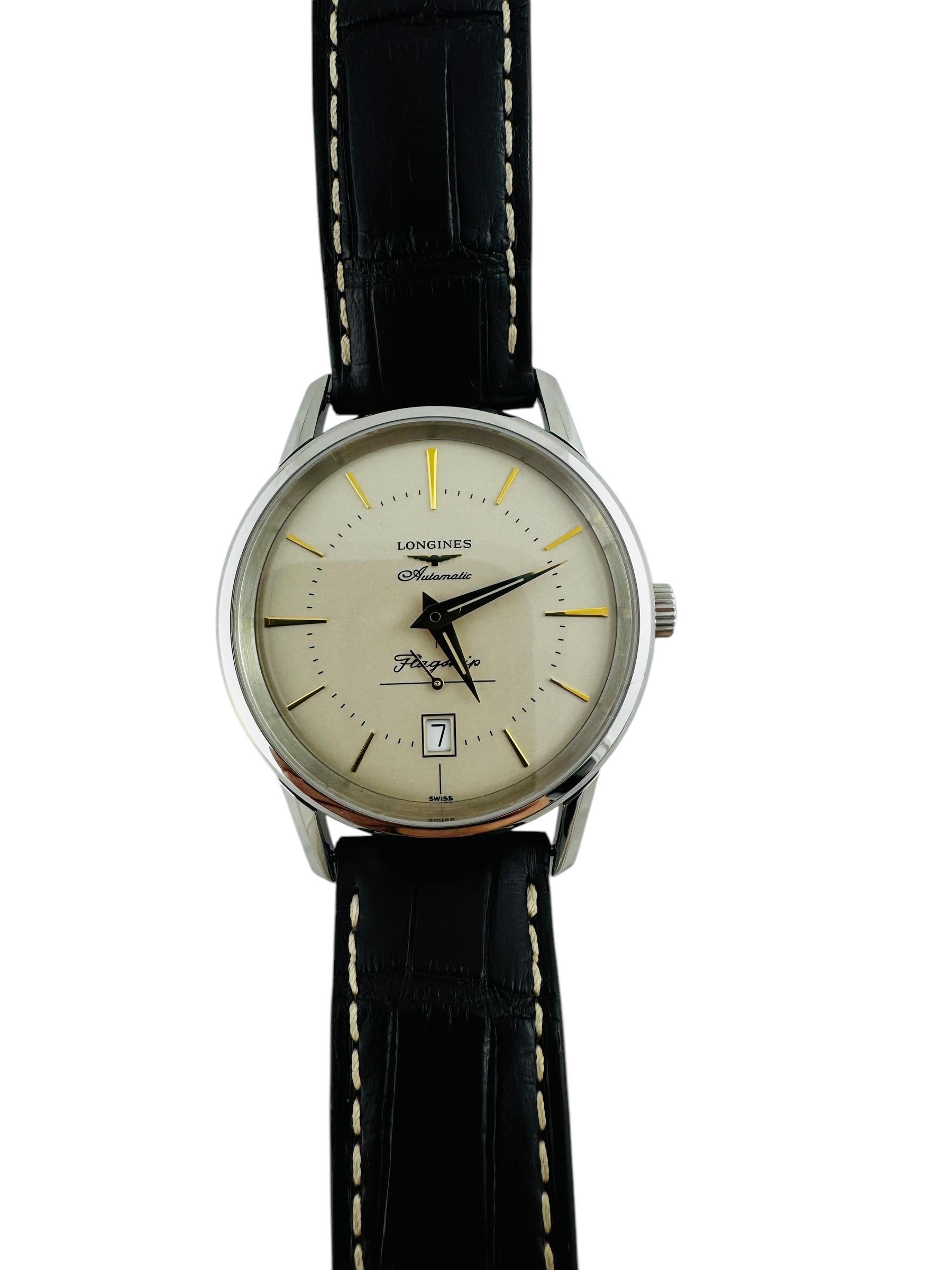 Longines Flagship Heritage Men's Watch

Model: L4.795.4
Serial: 53055621

This Longines Men's watch has a stainless steel case with an 18K yellow gold Medallion on the back of the case.

Case is 38.5mm in diameter

Ivory dial with gold markers.