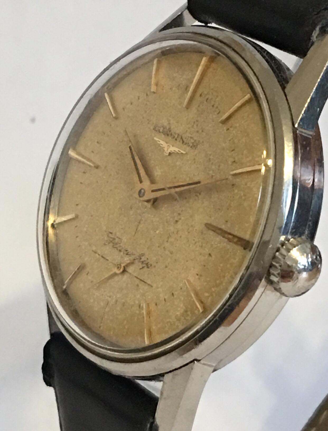 This stunning vintage watch is working and and ticking well. The Dial has aged. The strap is a bit worn and it has a gold plated buckle on it. 

Please study the images carefully as form part of the description.
