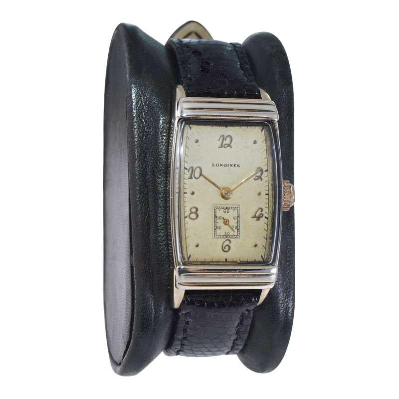 FACTORY / HOUSE: Longines Watch Company
STYLE / REFERENCE: Art Deco / Tonneau Shape
METAL / MATERIAL: Yellow Gold Filled 
CIRCA / YEAR: 1940's
DIMENSIONS / SIZE: Length 41mm X Width 21mm
MOVEMENT / CALIBER: Manual Winding / 17 Jewels / Caliber 9L