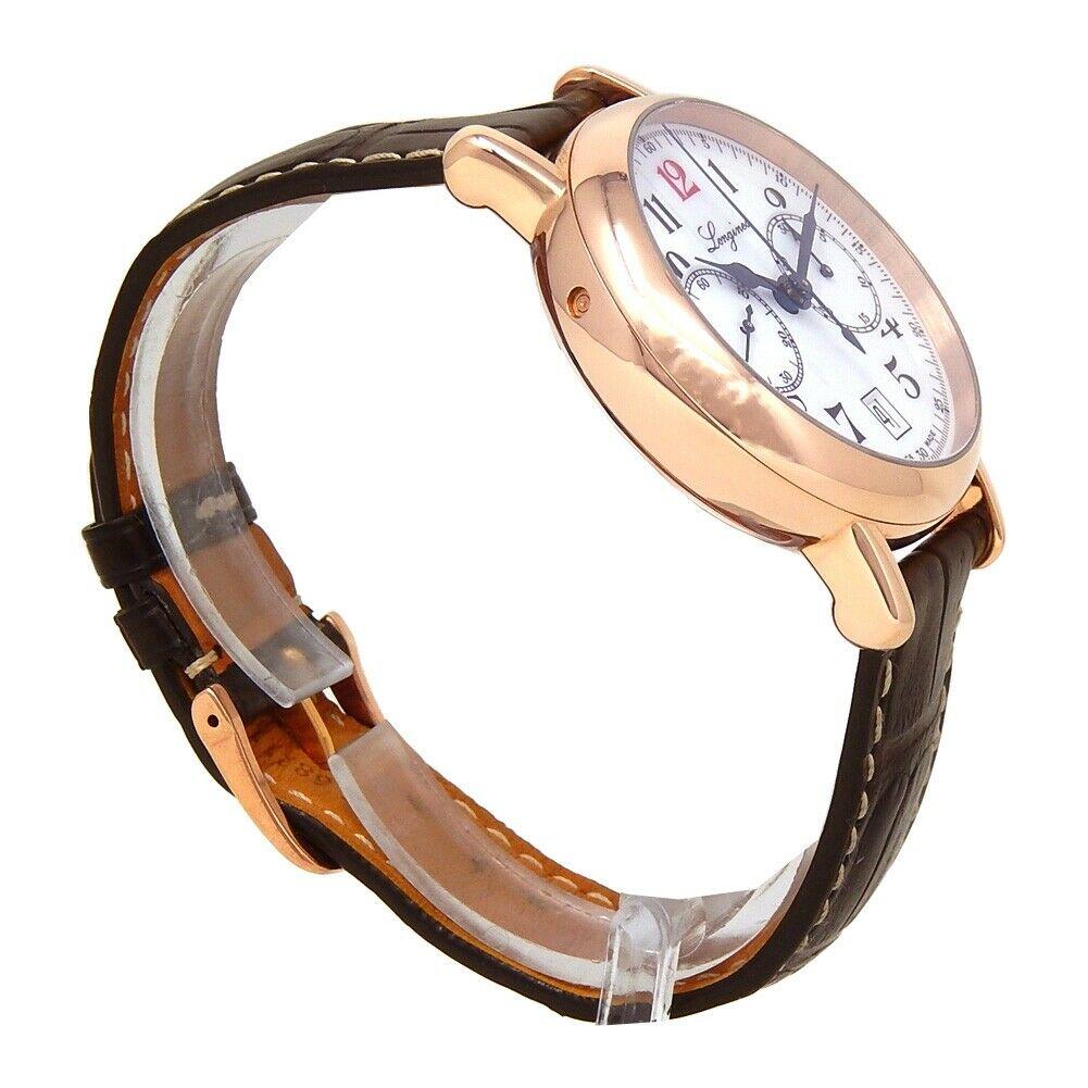 Brand: Longines
Band Color: Brown	
Gender:	Men's
Case Size: 40-43.5mm	
MPN: Does Not Apply
Lug Width: 19mm	
Features:	12-Hour Dial, Arabic Numerals, Day Indicator, Gold Bezel, Sapphire Crystal, Skeleton Back, Swiss Made, Swiss Movement
Style: