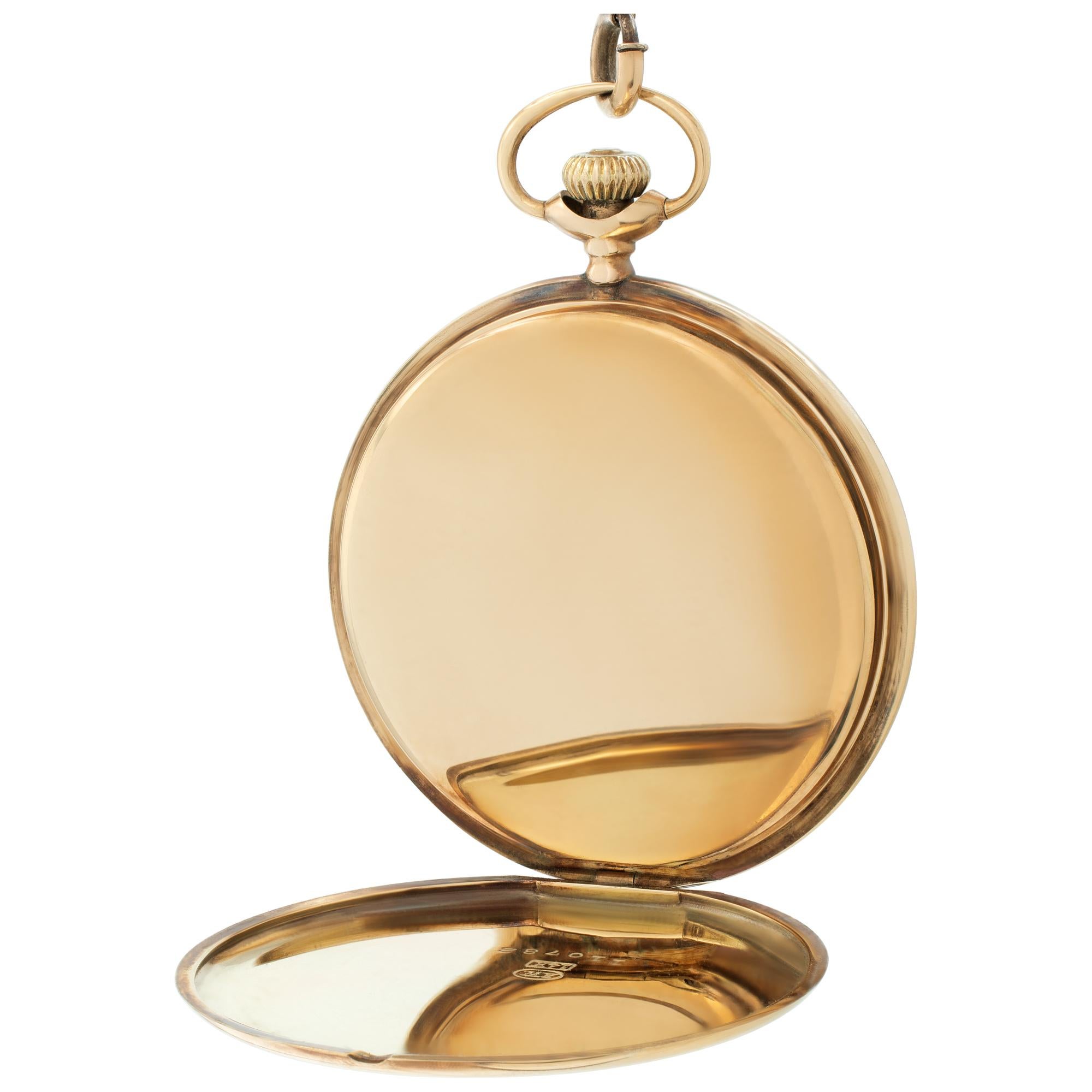 Longines pocket watch in 14k yellow gold with a gold plated chain. Manual wind 17 jewel movent. Arabic numerals. 43 mm case size. Fine Pre-owned Longines Watch. Certified preowned Vintage Longines pocket watch watch is made out of yellow gold. This