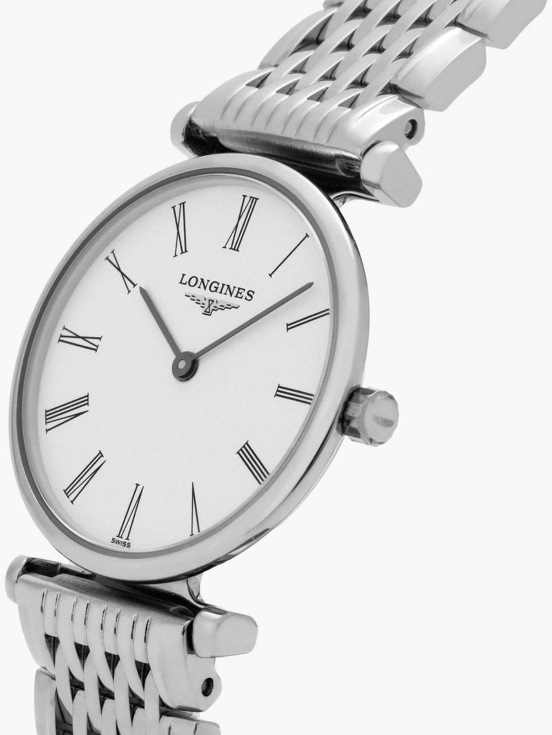 Material: Stainless steel
Glass: Scratch-resistant sapphire crystal
Dimension: Ø 24.00 mm
Water Resistance: 3 bar
Colour: White
Hour markers: Painted Roman numerals
Hands: Black hands
Movement Type: Quartz
Caliber: L209
Functions: Hours and