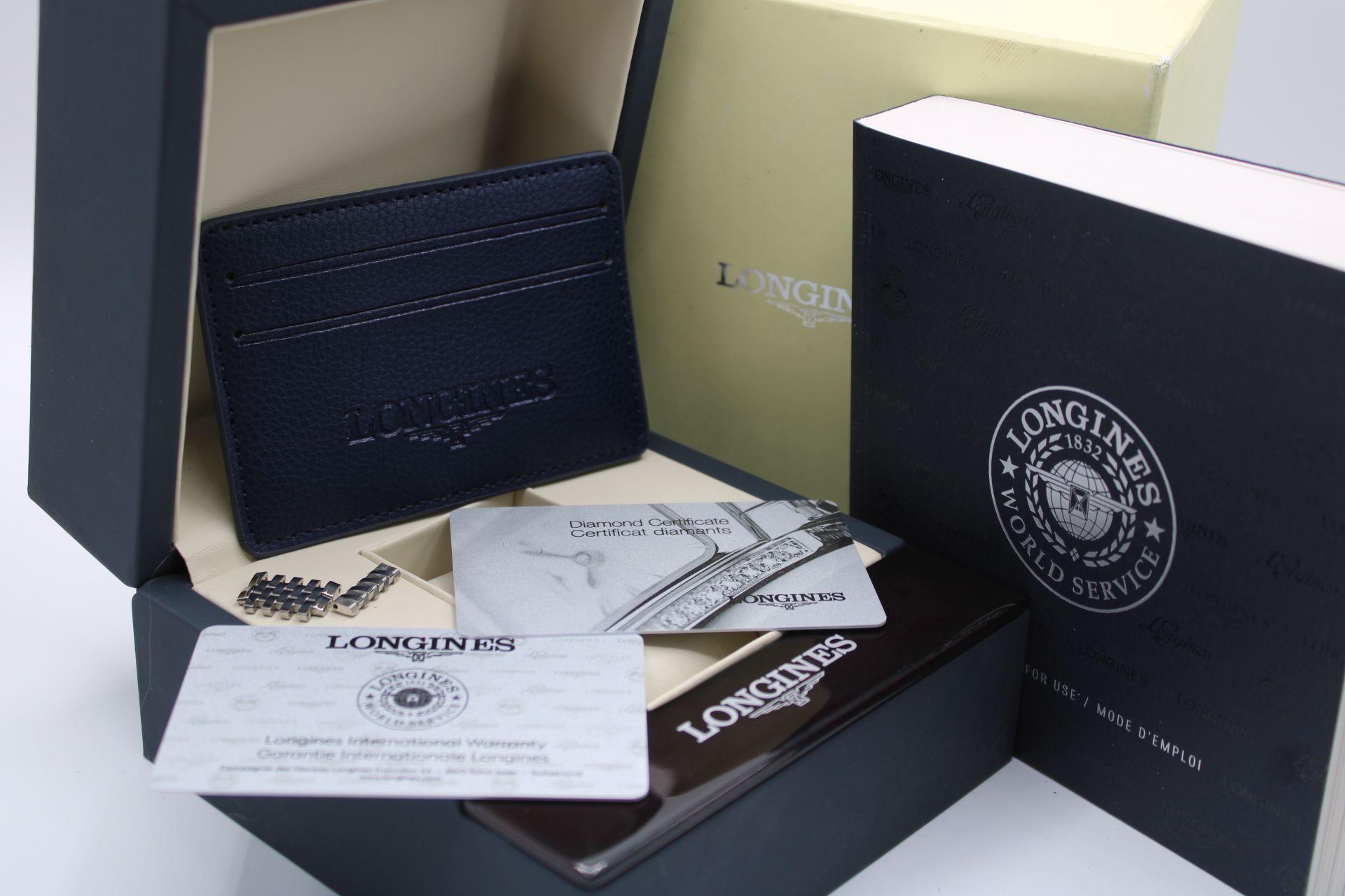This Longines La Grande Classique has had a quick check up in our workshop where it successfully passed all timing, water and pressure tests. Presented as a complete full set with inner and outer boxes, manual, wallet, gem stone card, swing tag and