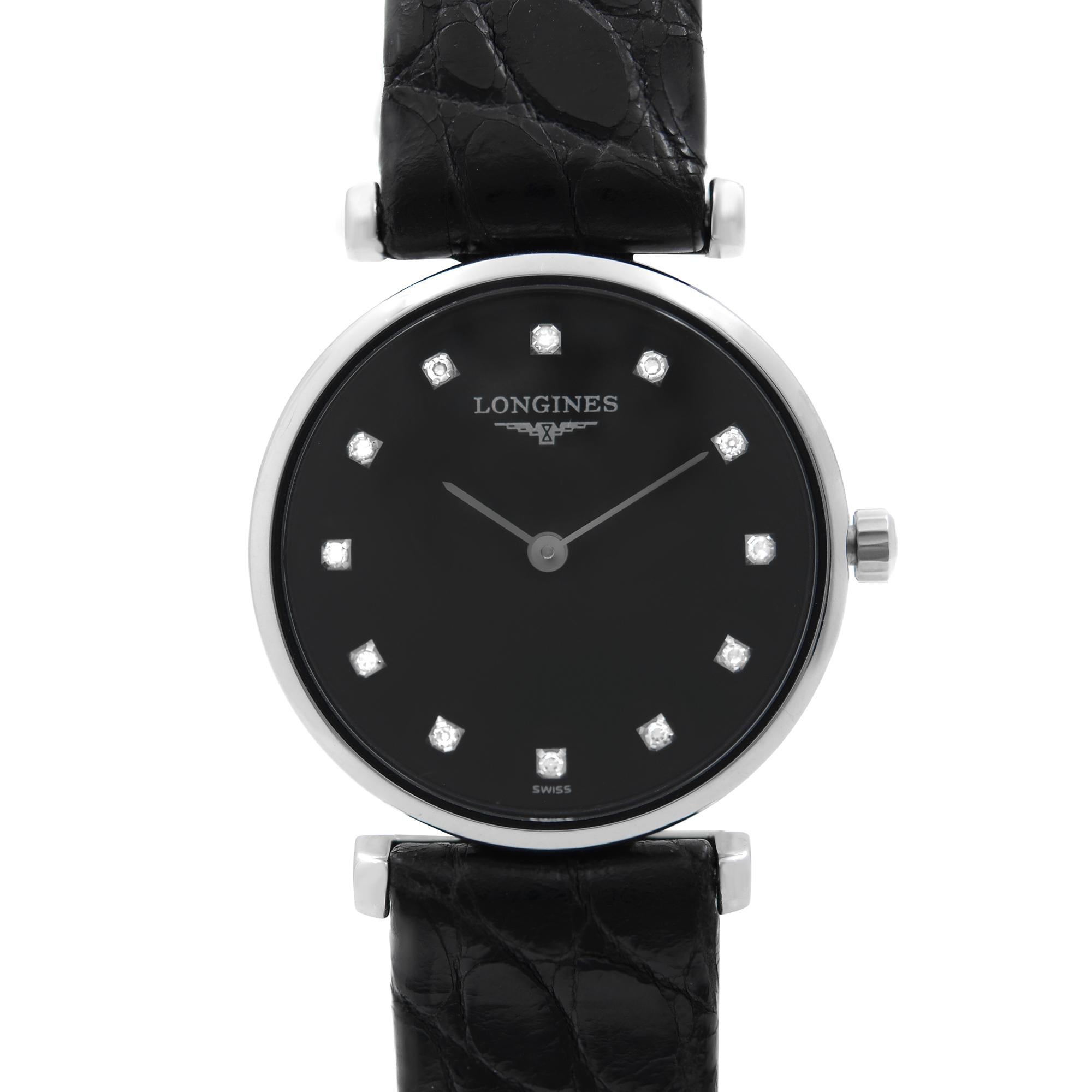 Never Worn Longines La Grande Classique Steel Black Diamond Dial Ladies Watch L4.209.4.58.2. This Beautiful Timepiece is Powered by a Quartz (Battery) Movement and Features: Round Stainless Steel Case with a Black Leather Strap, Fixed Stainless