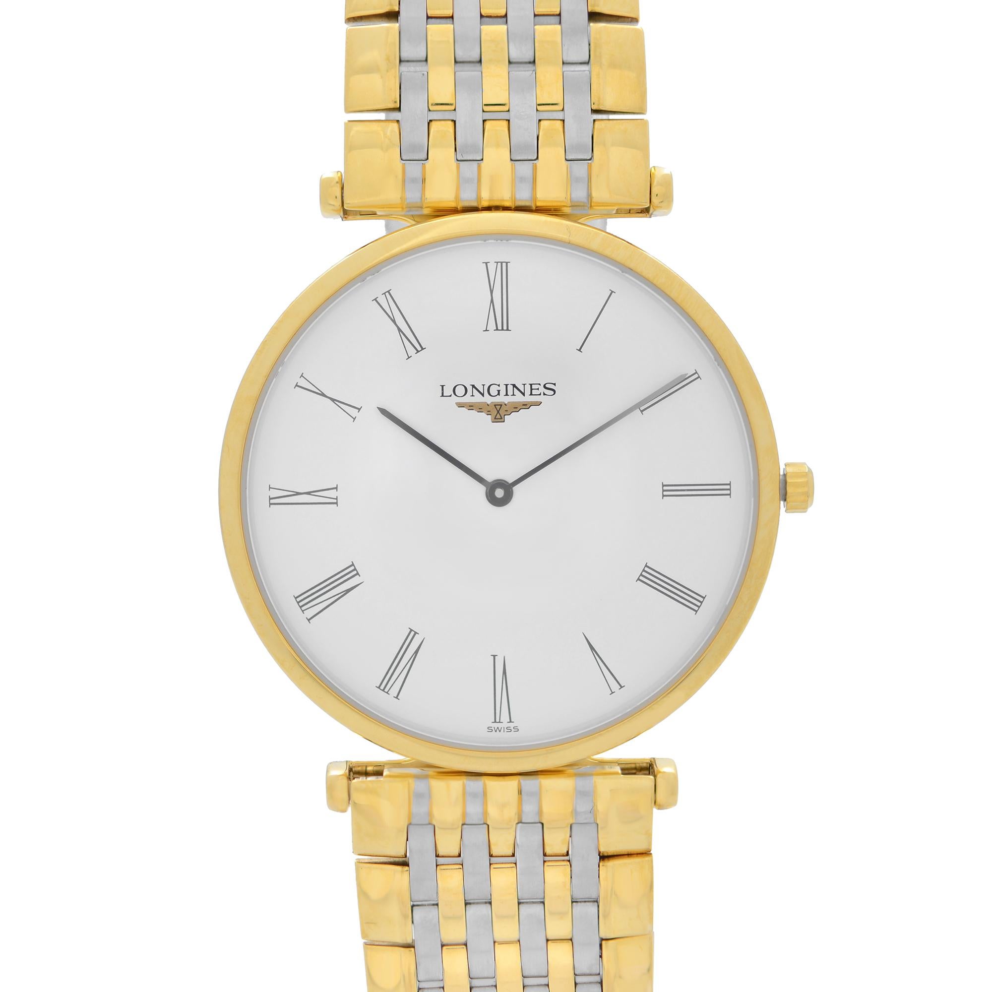 Pre-owned Excellent Condition. The gold-Tone part has minor blemishes and the back case has minor scratches. Longines La Grande Classique Two Tone Steel White Dial Quartz Watch L47092117. This Beautiful Timepiece Features: Stainless Steel Case with