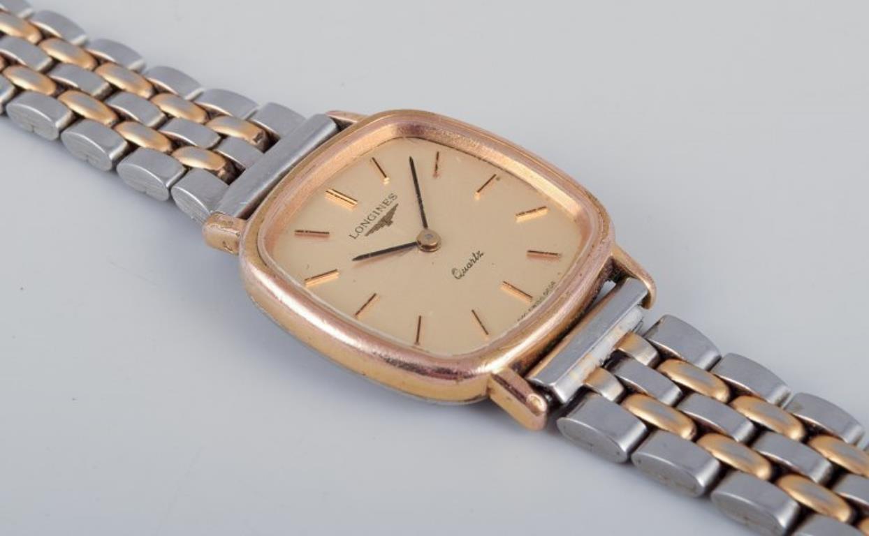 Longines ladies' wristwatch in brass and stainless steel. 1970s/80s. (Moderne) im Angebot
