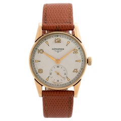 Orologio da polso Longines con movimento manuale a 17 Jewell. Numeri arabi (pari) 1948