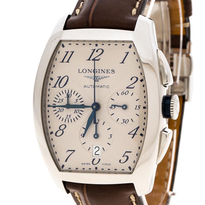 Designed with a blissful blend of luxury and fine craftsmanship, this Evidenza watch from Longines is sure to delight your style. In a stainless steel tonneau-shaped case, the watch functions in an automatic movement. A scratch-resistant sapphire