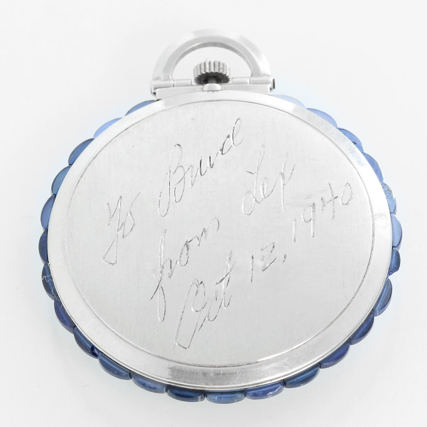 Longines Platinum Art Deco Pocket Watch - Manual winding. Platinum case sat with scalloped Sapphires ( 43 mm ); Inscription on caseback. Silver dial with personalized diamond dial. Pre -owned with custom box.