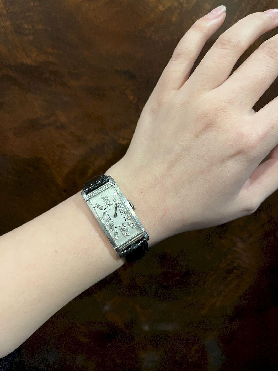 Longines Platinum Diamond Curvex Wrist Watch

Marked:
0%Irid. Plat 
From D.G.G, To J. E.L 9-22-40

Approximate Dimensions: 
2.3 cm (Unclasped Length) 
30 mm x 16 mm (Dial) 
36 mm x 20 mm (Case) 
16 mm (Lug) 
 33.0 grams in weight.