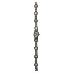 Longines Uhr aus Platin mit Smaragd und Diamanten