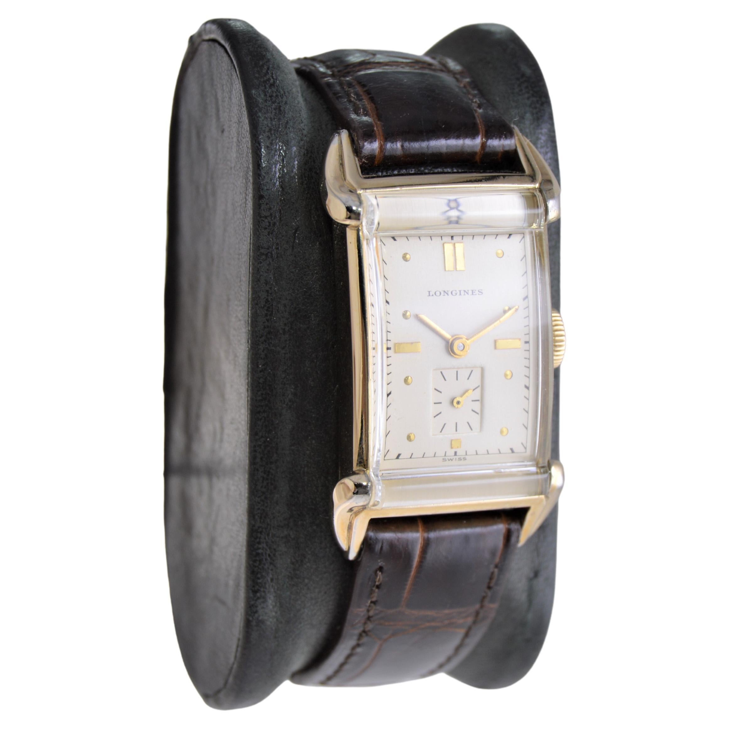 FACTORY / HOUSE: Longines Watch Company
STYLE / REFERENCE: Art Deco Tank
METAL / MATERIAL: Yellow Gold Filled
CIRCA / YEAR: 1940's
DIMENSIONS / SIZE: Length 41mm x Width 23mm
MOVEMENT / CALIBER: Manual Winding / 17 Jewels / Caliber 9L
DIAL / HANDS: